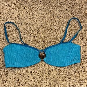 NWOT Shop Homewurk size medium teal bikini with gold shell emblem